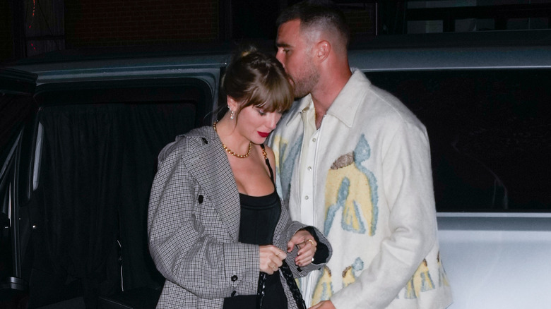 Travis Kelce and Taylor Swift arriving at SNL Afterparty