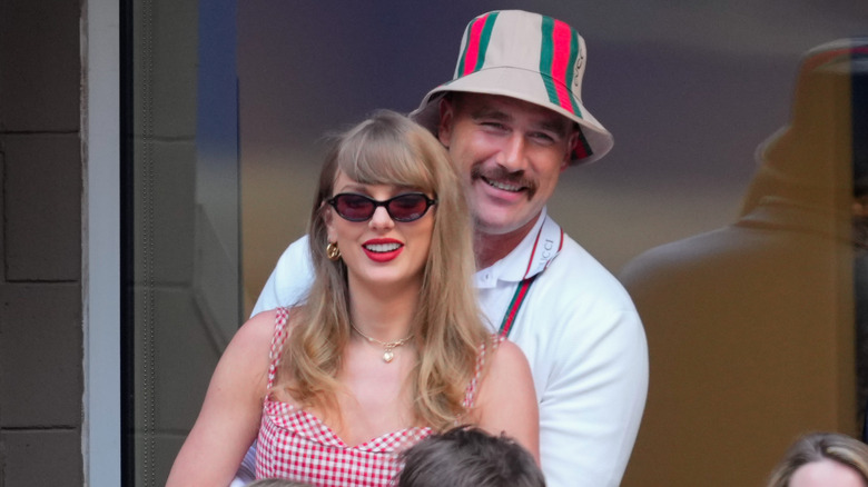 aylor Swift and Travis Kelce embracing during the 2024 US Open Tennis Championships