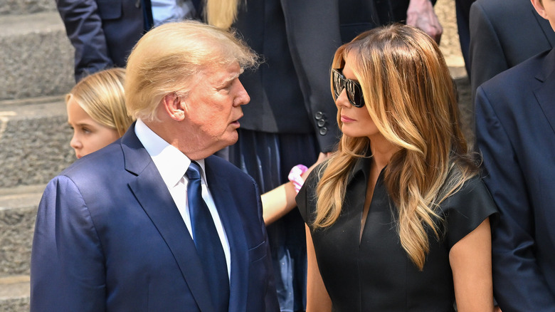 Donald and Melania Trump talking