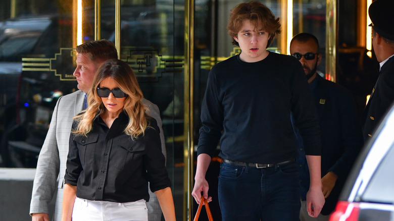 Melania and Barron Trump walking
