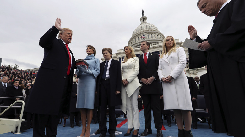 Donald Trump swearing on Bible before family
