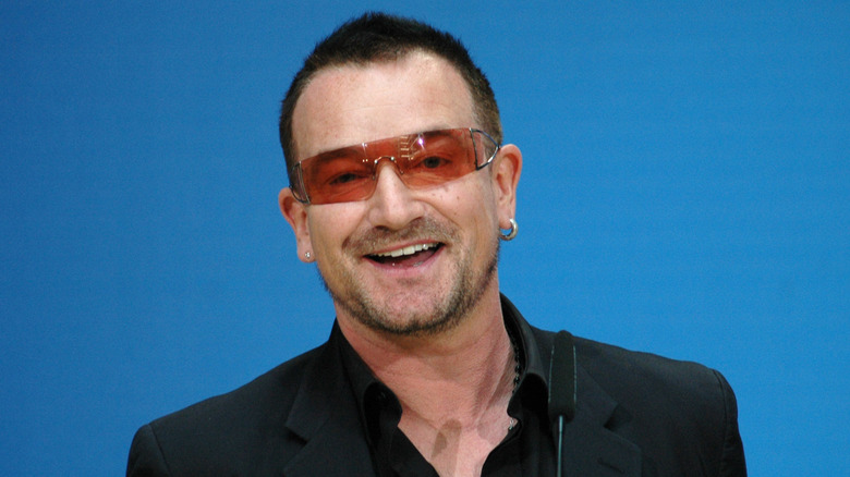 Bono smiling onstage