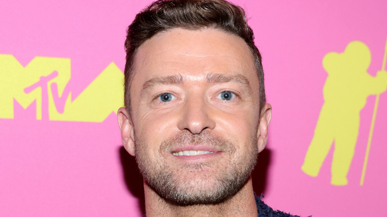 Justin Timberlake poses at the VMAs