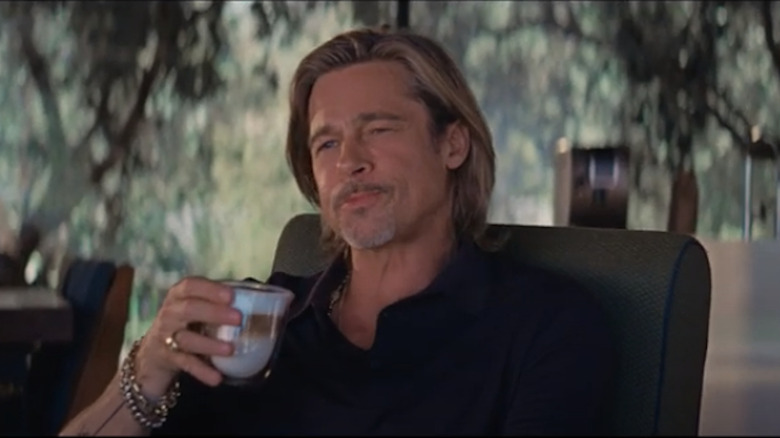 Brad Pitt enjoying a sip of coffee