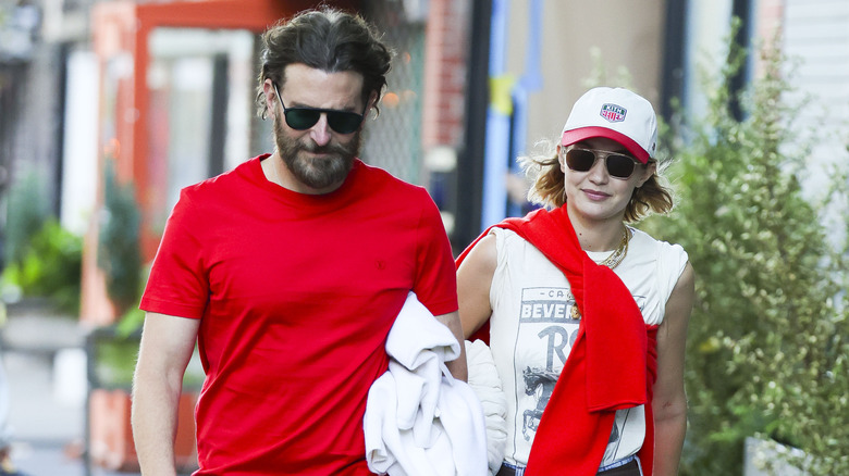 Gigi Hadid and Bradley Cooper walking