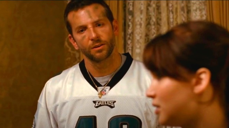 Bradley Cooper as Pat wears an Eagles jersey