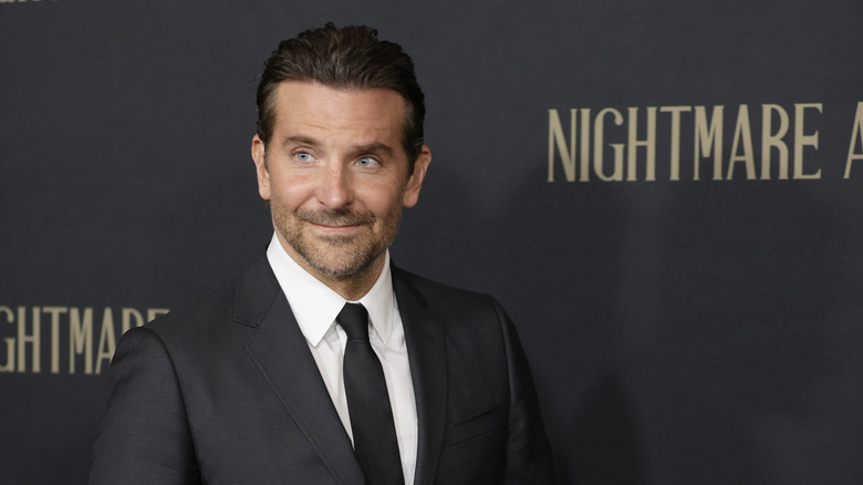 Bradley Cooper posing at the Nightmare Alley premiere