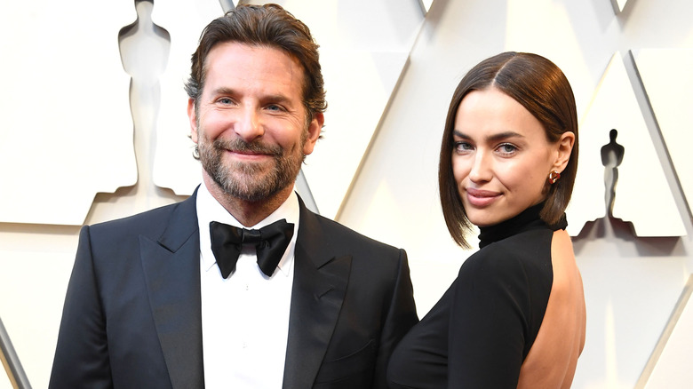 Bradley Cooper posing with Irina Shayk at the Oscars