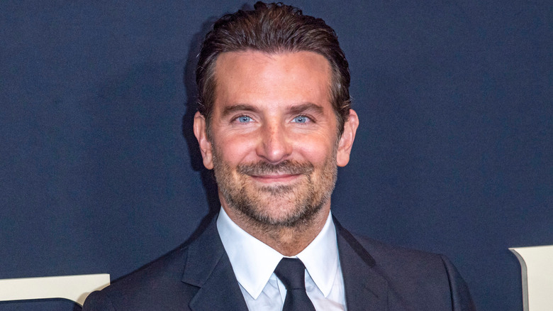 Bradley Cooper smiling on the red carpet
