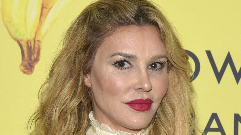 Brandi Glanville stern, red lipstick