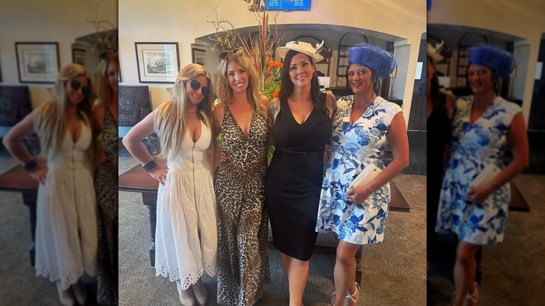 Dressed in a revealing white dress, Brandi Passante smiles in a group photo with friends.