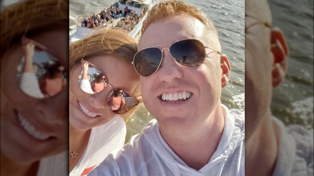 Brandi and Bryan Redmond posing for a selfie