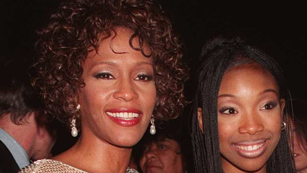 Whitney Houston and Brandy Norwood attend an event