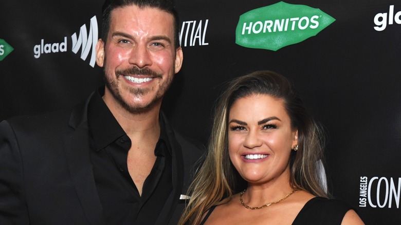 Jax Taylor and Brittany Cartwright smile red carpet