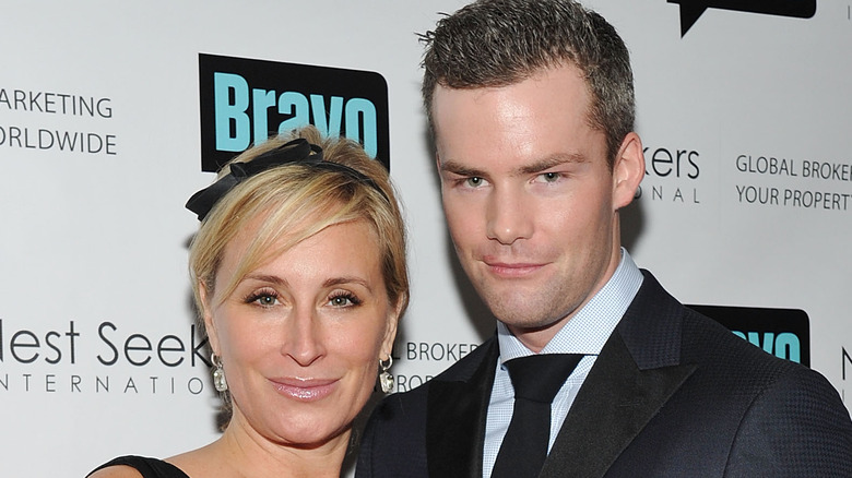 Ryan Serhant Sonja Morgan pose in 2012