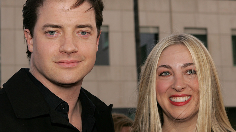 Brendan Fraser and Afton Smith posing