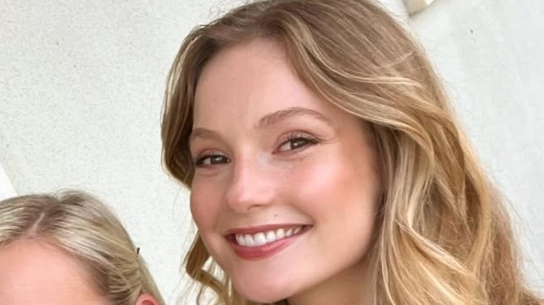 Hannah Dodd flashes a toothy smile.