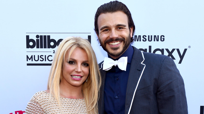 Britney Spears and Charlie Ebersol smiling