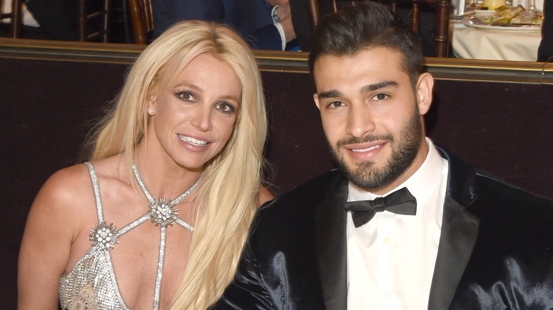 Britney Spears and Sam Asghari smiling