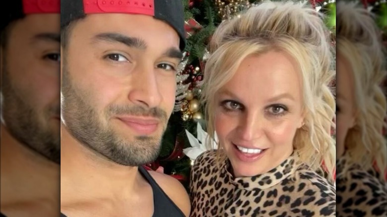 Sam Asghari and Britney Spears smiling