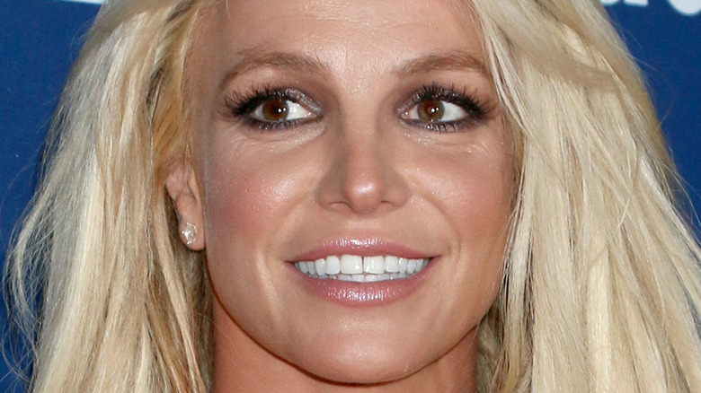 Britney Spears smiling smoky eye nude lip