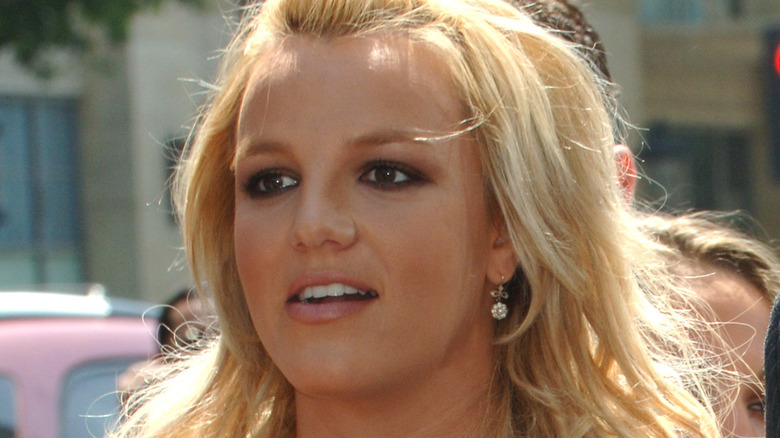 Britney Spears talking outside
