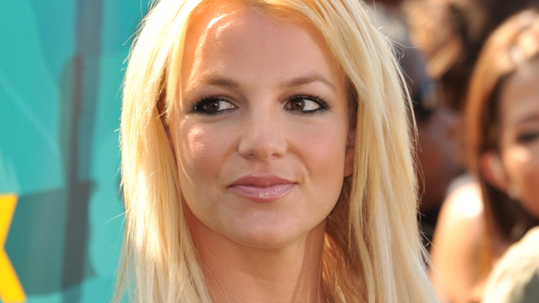 Britney looks to the side on red carpet