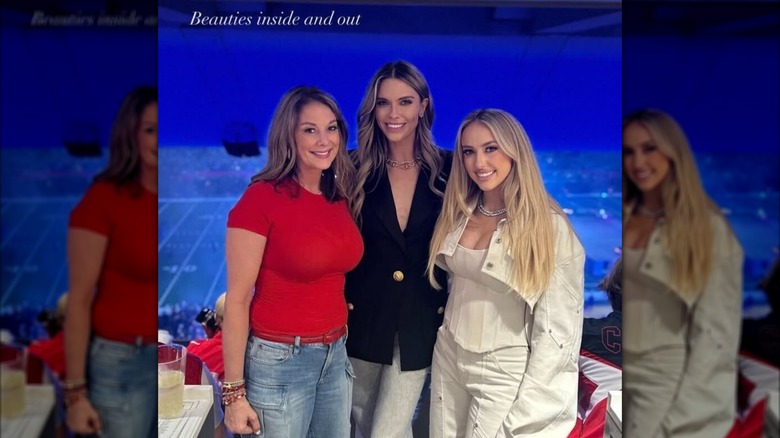 Randi Mahomes, Bettina Anderson, and Brittany Mahomes posing