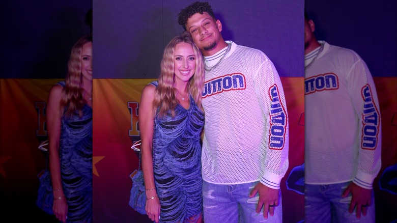Brittany Mahomes and Patrick Mahomes backstage at Kelce Jam 2024.