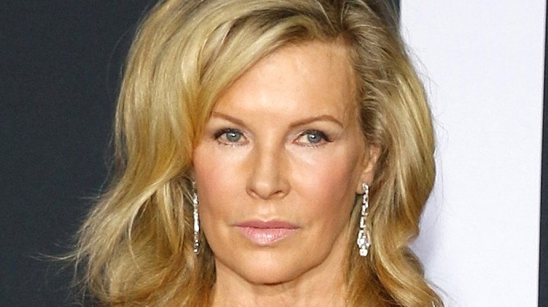 A close-up of Kim Basinger smiling