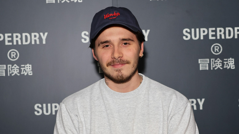 Brooklyn Beckham wearing Wendy's hat