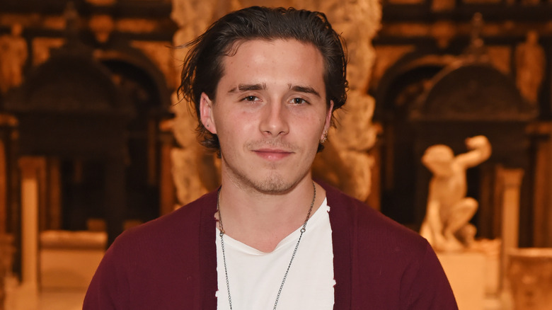 Brooklyn Beckham smiling