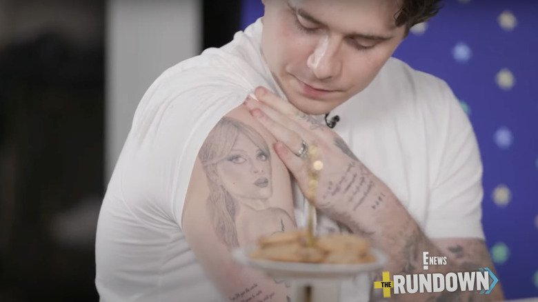 Brooklyn Beckham shows off his tattoo
