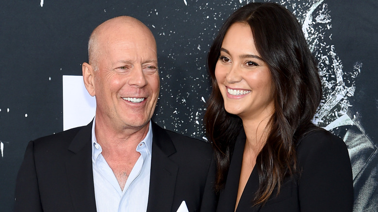 Bruce Willis and Emma Heming smiling