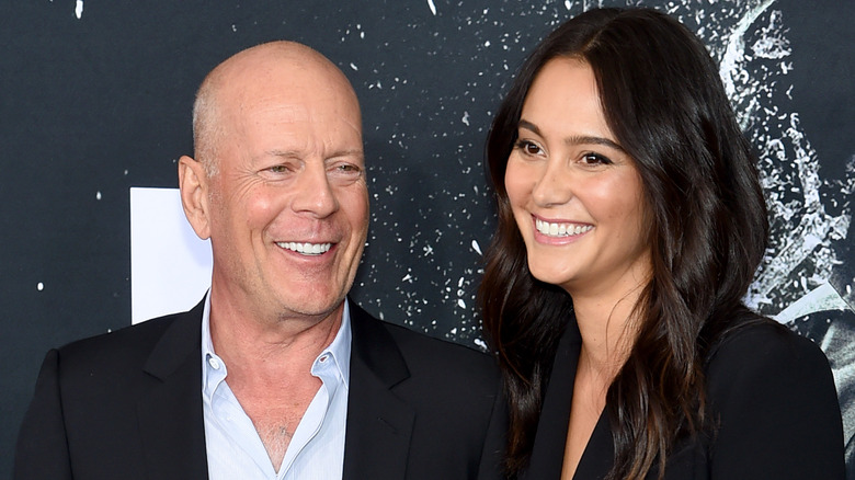 Bruce Willis and Emma Heming smiling