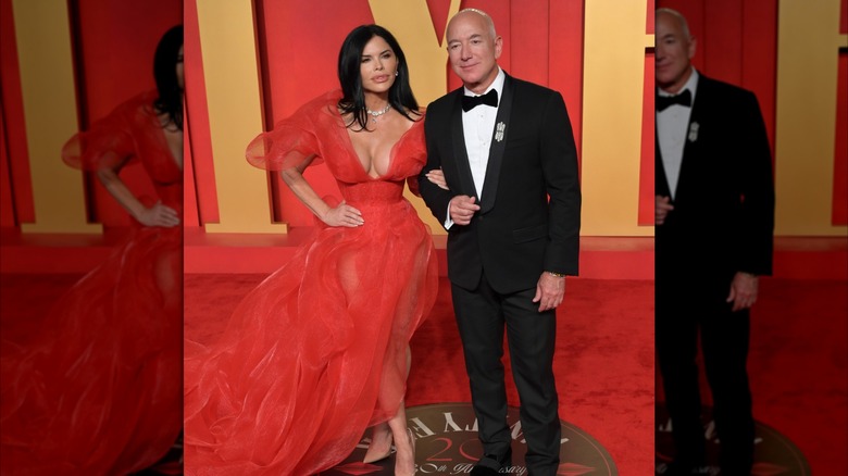 Lauren Sanchez wearing a busty tulle dress on the red carpet with Jeff Bezos