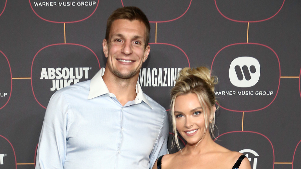 Camille Kostek and Rob Gronkowski posing