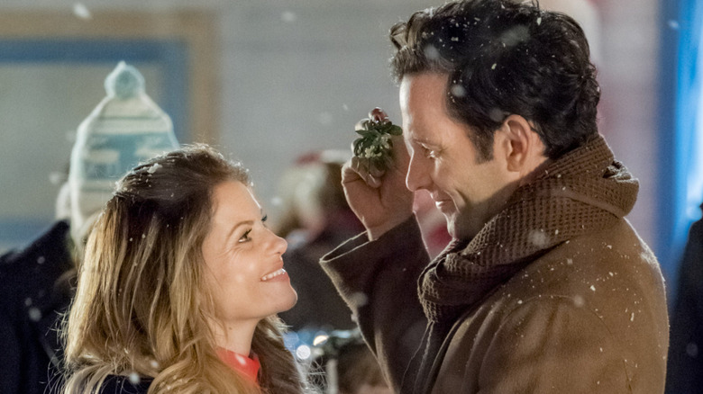 Candace Cameron Bure and Eion Bailey in "Switched for Christmas"