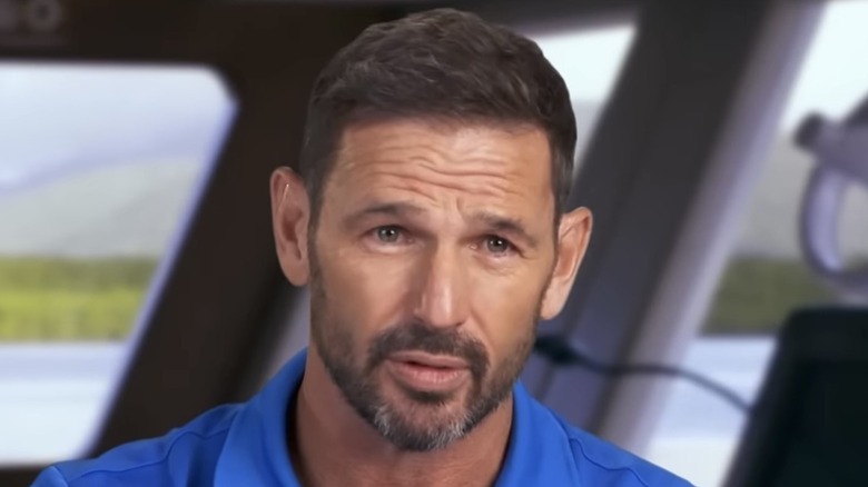 Jason Chambers wearing blue