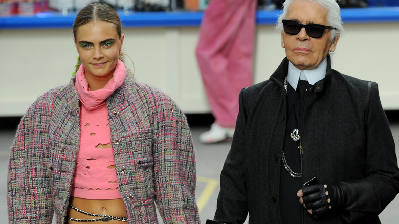 Cara Delevingne and Karl Lagerfeld, walking the runway
