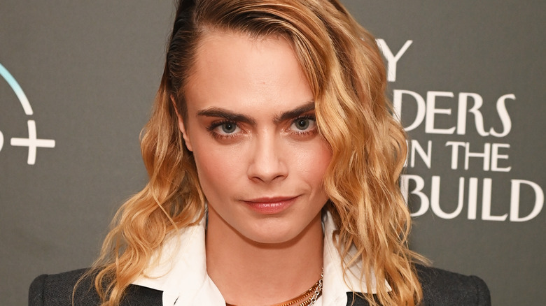 Cara Delevingne in black hat