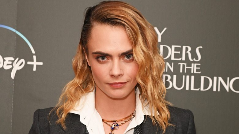 Cara Delevingne in black hat