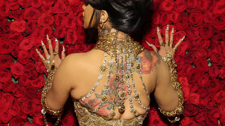Look Cardi B shows off huge floral back tattoo  UPIcom