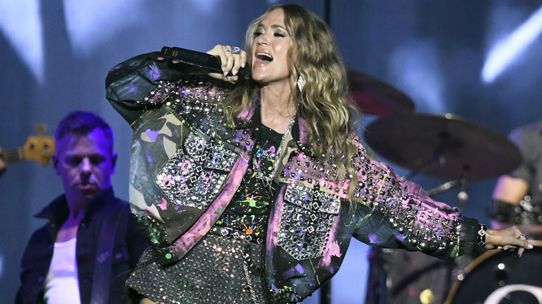 Carrie Underwood performing on stage at Velocity Festival.
