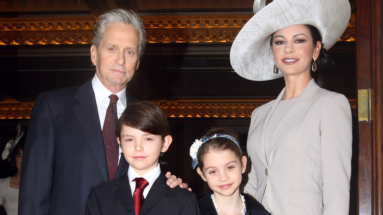 Michael Douglas and Catherine Zeta-Jones pose with Dylan and Carys in 2011.
