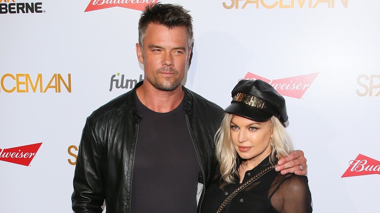Josh Duhamel with arm around Fergie