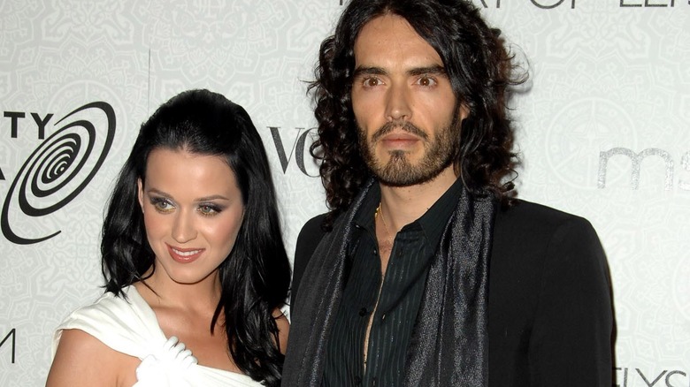 Katy Perry, Russell Brand posing