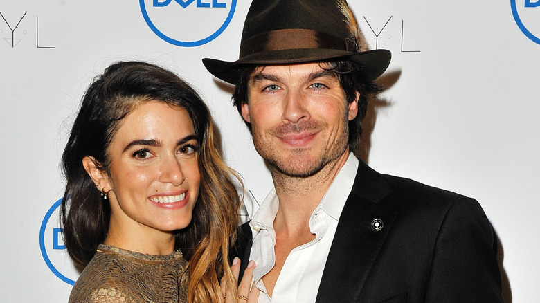 Ian Somerhalder and Nikki Reed posing