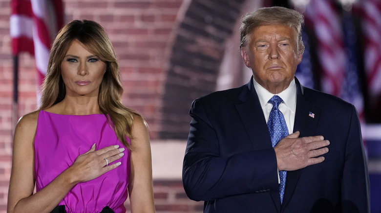 Melania Trump and Donald Trump both pledging