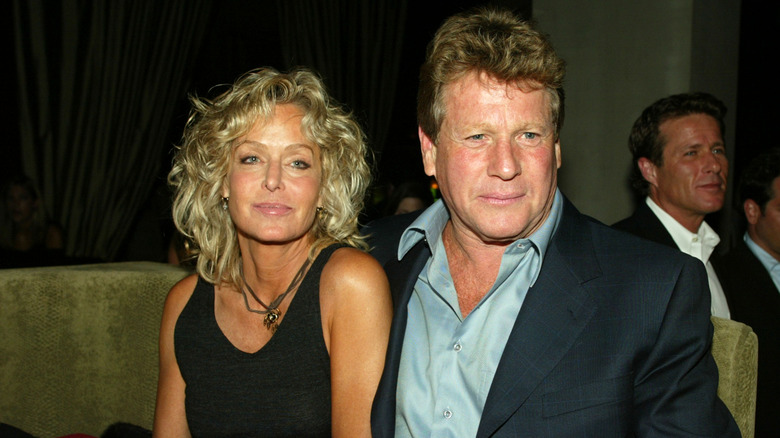 Farrah Fawcett & Ryan O'Neal sitting down